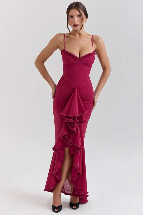 Front view of fuchsia ruffled sweetheart maxi dress with spaghetti straps and slit hem