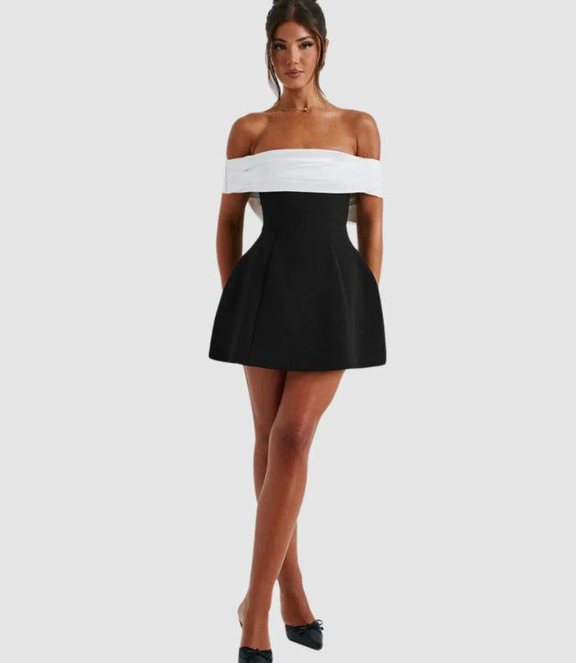 Full-length front view of women's black and white color-block party mini dress