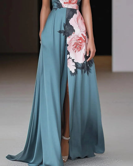 Side detail of floral maxi dress showing high slit, teal fabric drape, and peony print panel