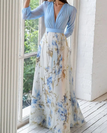 Back view of blue long sleeve maxi dress with cream floral botanical print