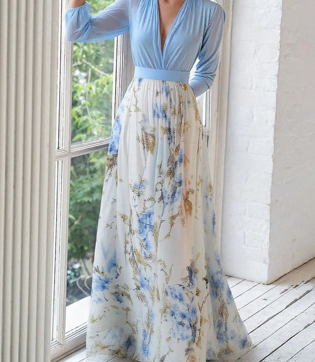 Back view of blue long sleeve maxi dress with cream floral botanical print