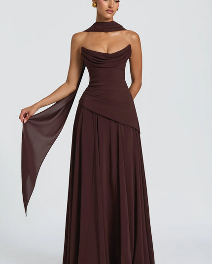 Burgundy strapless cowl neck maxi dress with draped bodice and flowing skirt front