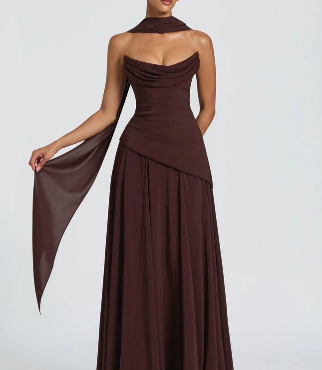 Burgundy strapless cowl neck maxi dress with draped bodice and flowing skirt front