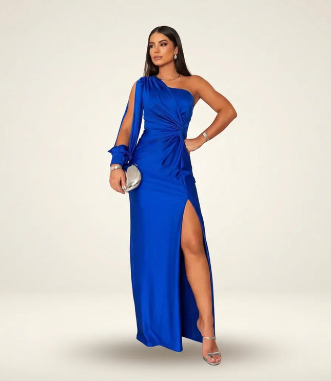 Royal blue one-shoulder draped maxi dress with flowing cape sleeve