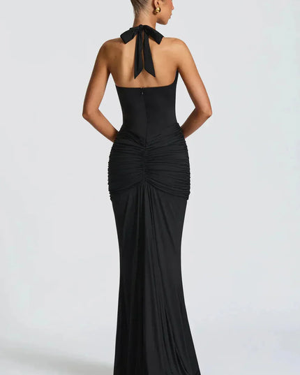 Back view of black halter maxi dress with tied neck detail