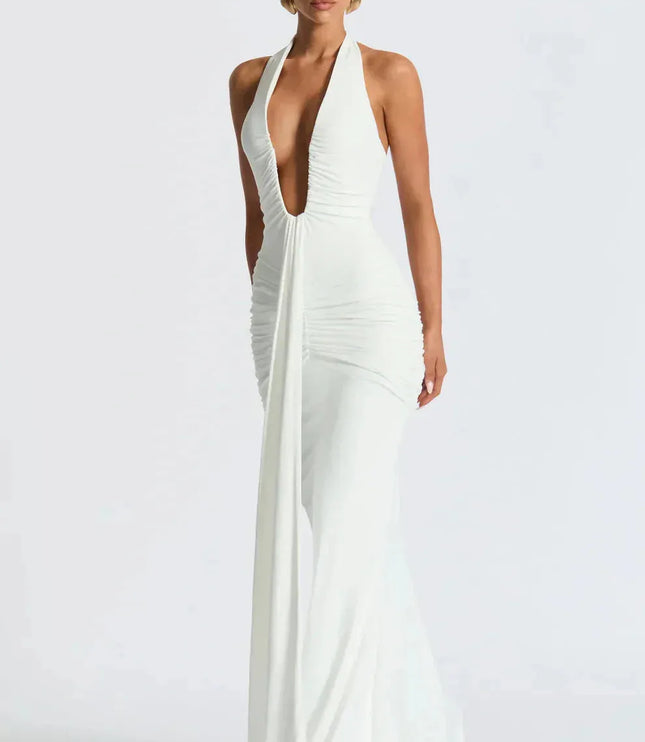 Ivory halter maxi dress with ruched bodice and flowing skirt