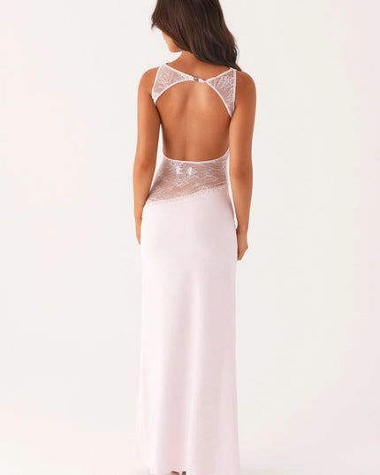 Pale pink maxi dress with open back and lace cutout detail, rear view
