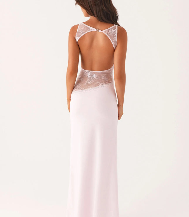 Pale pink maxi dress with open back and lace cutout detail, rear view