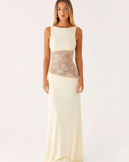 Cream sleeveless maxi dress with lace cutout at waist, front view