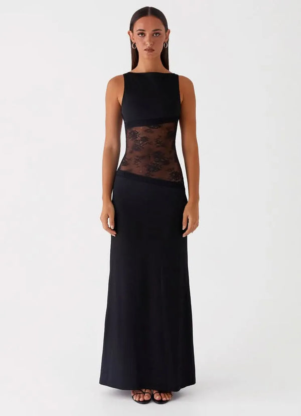 Black sleeveless maxi dress with lace cutout at waist, front view