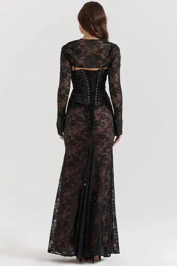 Rear detail of black lace maxi dress showing corset back and train