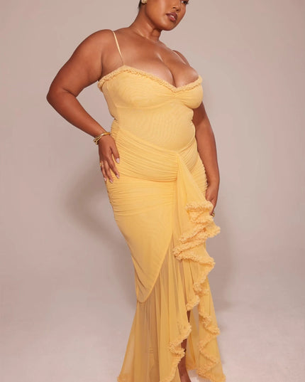Yellow spaghetti strap maxi dress with ruched waist and ruffled asymmetrical skirt
