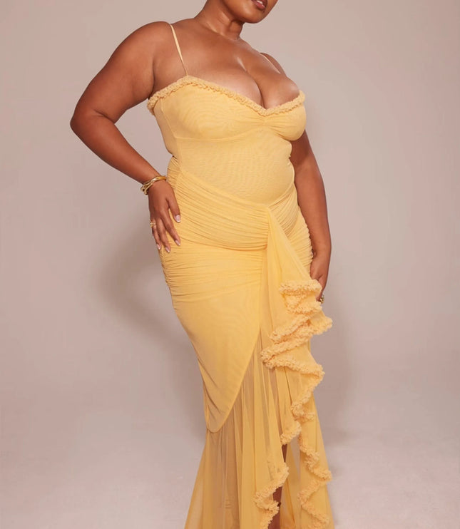 Yellow spaghetti strap maxi dress with ruched waist and ruffled asymmetrical skirt