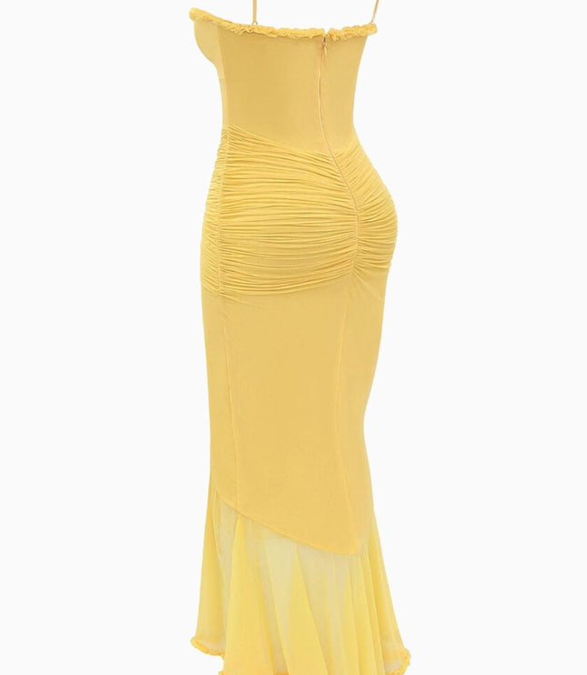 Back flat lay of yellow maxi dress with ruffled trim and spaghetti straps