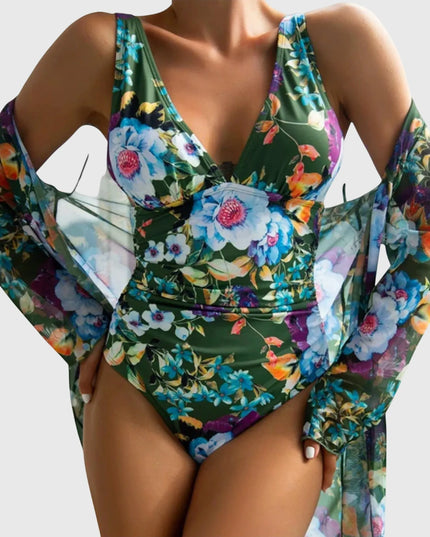 Green floral one-piece swimsuit with long-sleeve wrap, colorful botanical print front view