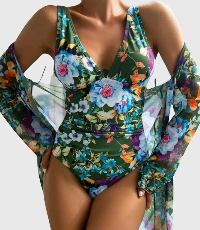 Green floral one-piece swimsuit with long-sleeve wrap, colorful botanical print front view