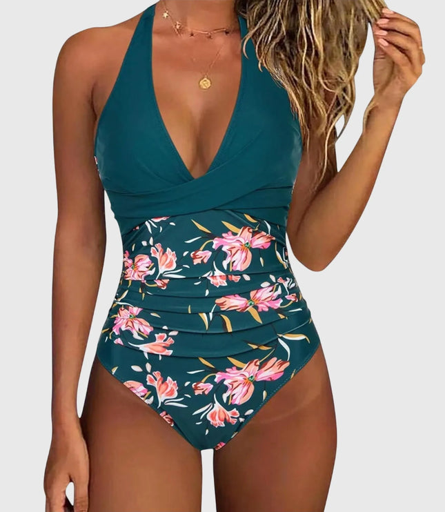 Teal v-neck one-piece swimsuit with pink floral print and ruched waist