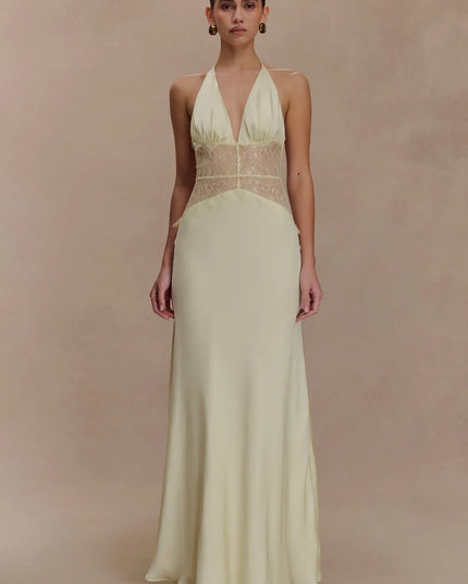 Pale yellow women halter lace maxi dress with deep V neckline and sheer lace corset-style waist