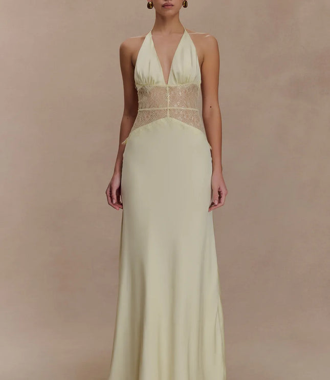 Pale yellow women halter lace maxi dress with deep V neckline and sheer lace corset-style waist