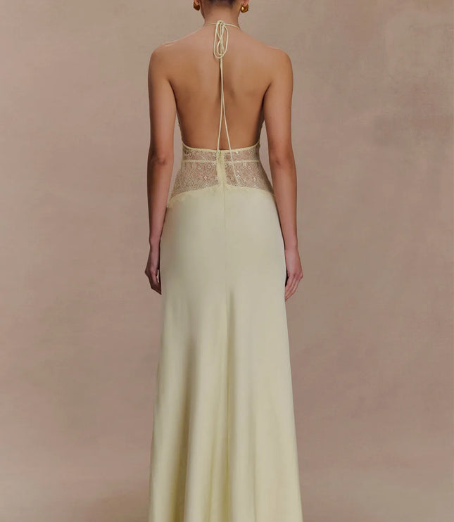 Back view of ivory halter lace maxi dress with open back and tie neck detail