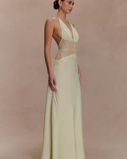 Side view ivory halter lace maxi dress with deep V neckline and sheer lace waist