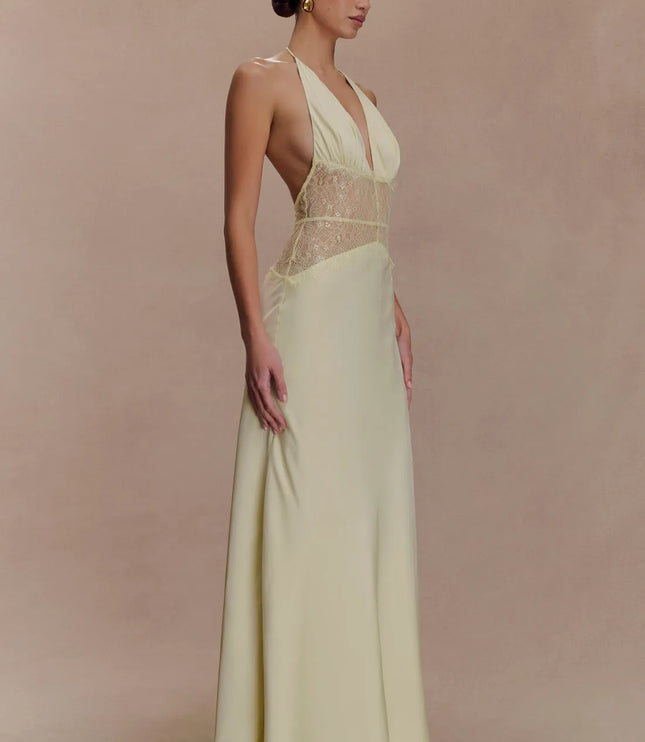 Side view ivory halter lace maxi dress with deep V neckline and sheer lace waist