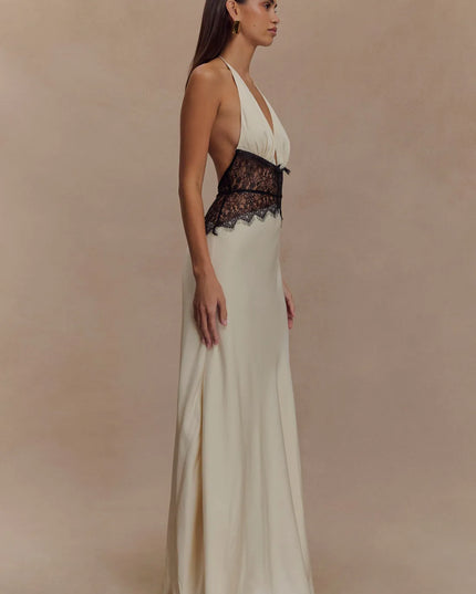 Side view ivory halter lace maxi dress showing plunging V bodice, open sides, and lace waist