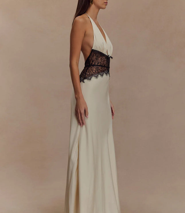 Side view ivory halter lace maxi dress showing plunging V bodice, open sides, and lace waist