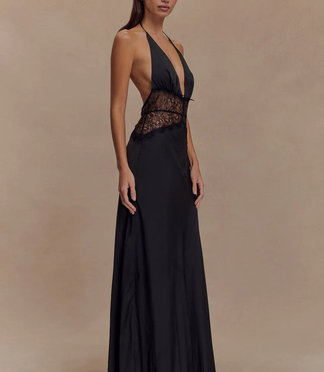 Angled side view black halter lace maxi dress with deep V neckline and sheer lace midsection