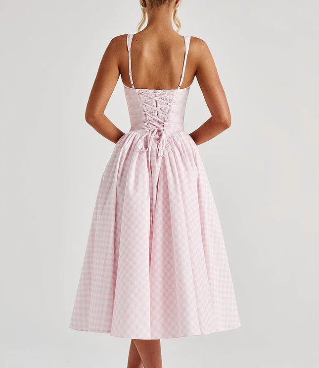 Pink gingham midi dress with functional lace-up back detail and flared hem back view