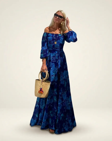 Women's wedding guest maxi dress with draped waist and gathered sleeve cuffs