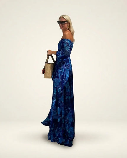 Women floral navy maxi dress side profile showing flowing full-length skirt