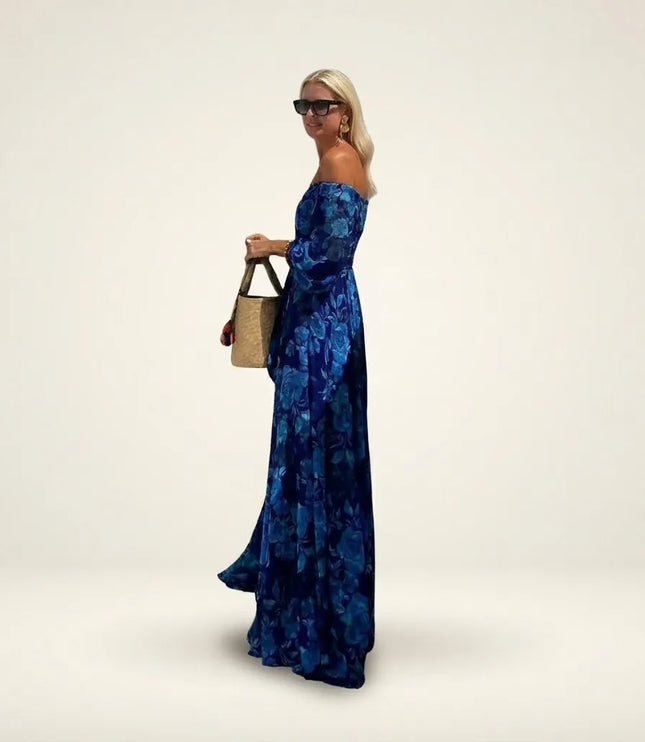 Women floral navy maxi dress side profile showing flowing full-length skirt