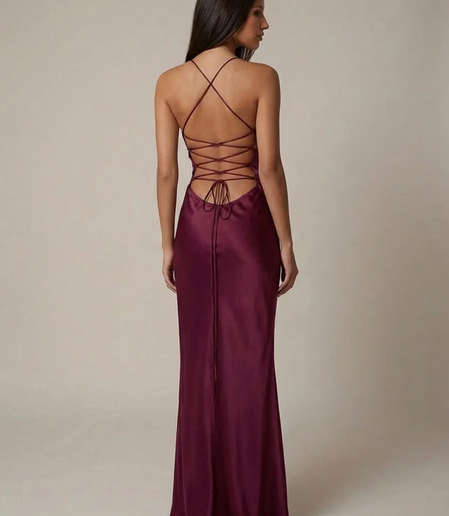 Back view of burgundy beaded maxi dress with crisscross straps and open back lace-up design