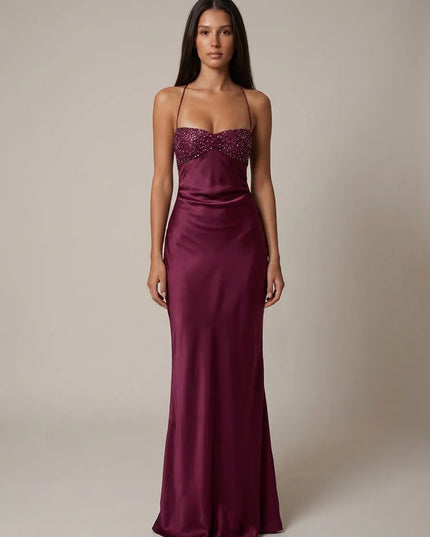 Close-up of pink beaded halter maxi dress bodice with ruched sweetheart neckline and pearl details