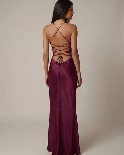 Back view of burgundy beaded maxi dress with crisscross straps and open back lace-up design