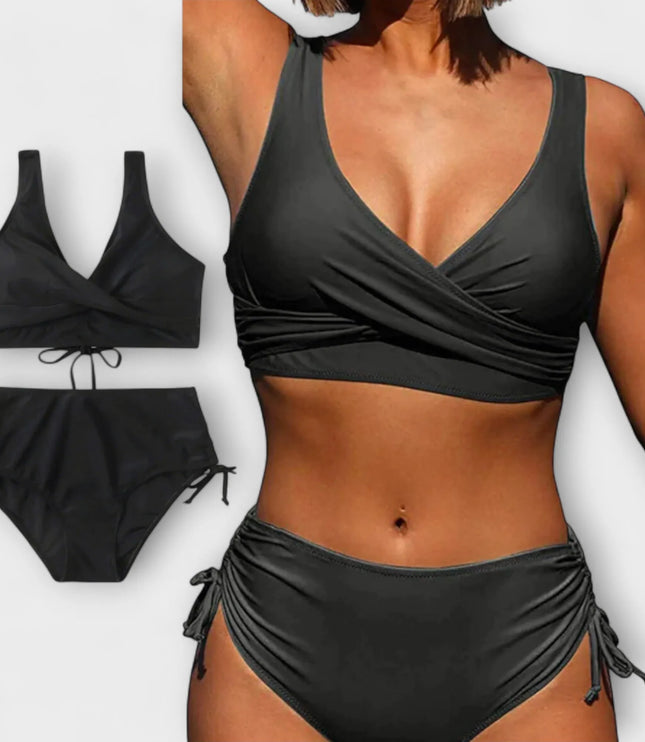 Black two-piece wrap bikini swimsuit with crossover top and tie-side bottoms