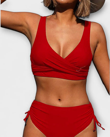 Red wrap crossover bikini top with v-neckline and ruched side-tie bottom