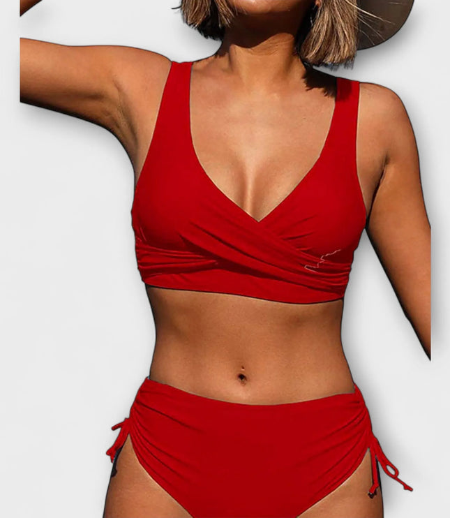 Red wrap crossover bikini top with v-neckline and ruched side-tie bottom