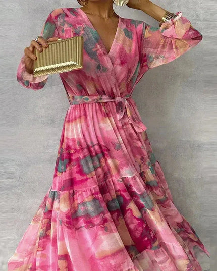Front view of pink floral wrap maxi dress with voluminous puffed sleeves