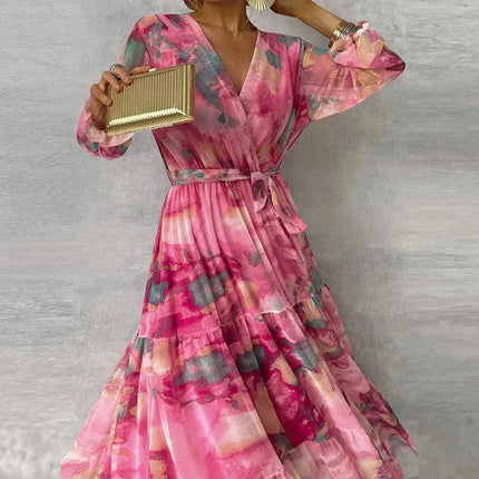 Front view of pink floral wrap maxi dress with voluminous puffed sleeves