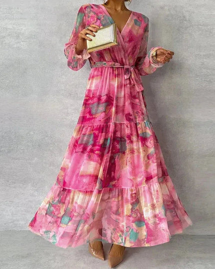 Full length pink floral v-neck maxi dress with puffed sleeves and ruffled layers