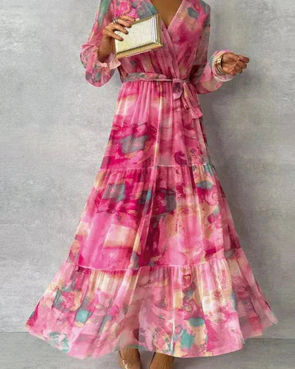 Pink floral maxi dress with v-neck and puffed sleeves, tiered skirt