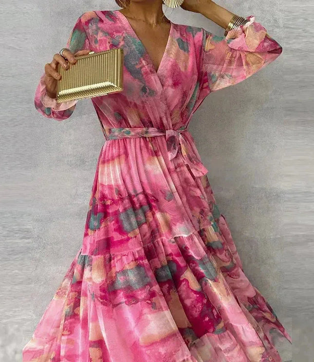 Front view of pink floral v-neck maxi dress with voluminous puffed sleeves