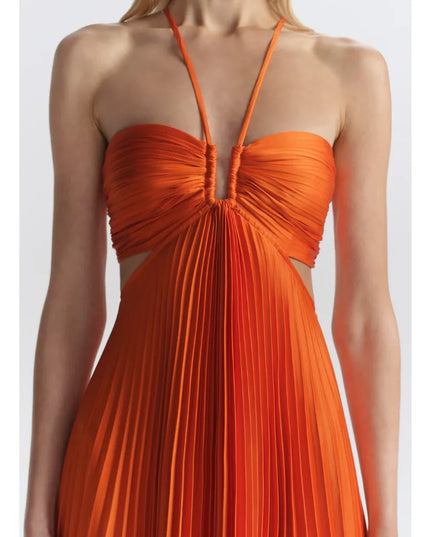 Close-up of orange halter maxi party dress showing ruched bust and side cutouts