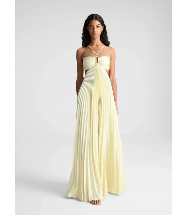 Back view of orange halter maxi party dress with open sides and pleated skirt