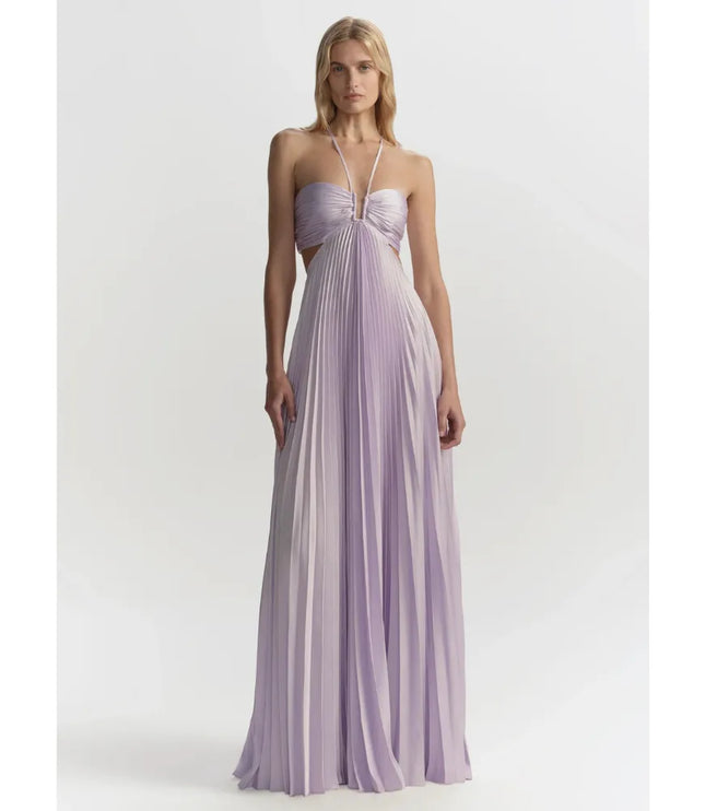 Close-up of pale yellow halter maxi party dress showing ruched bodice and cutout