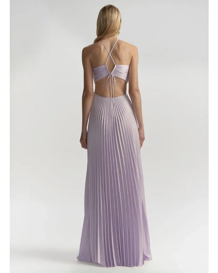 Back view of lavender halter maxi dress with open back and flowing pleated skirt