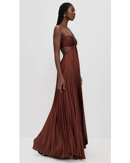 Side view of brown halter maxi party dress with open waist and flowing pleated skirt