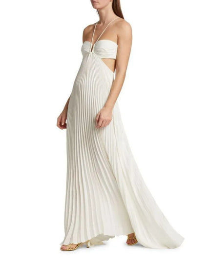 Side view of ivory women maxi halter party dress with pleated skirt and cutout detail